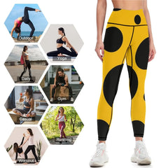 Black polka dots on yellow background Leggings
